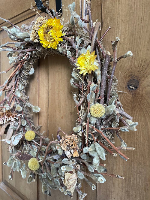 The Fading Light Wreath - magnolia stems and sunny strawflower