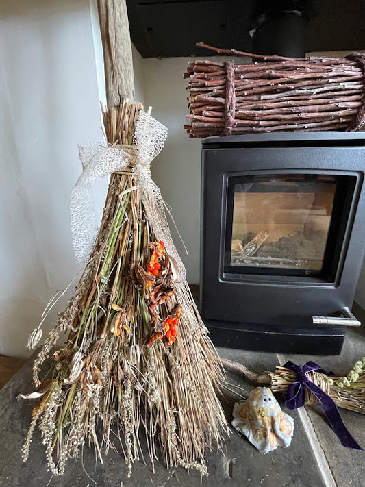 Witch's dried flower broom - orange seedpods and beige bow
