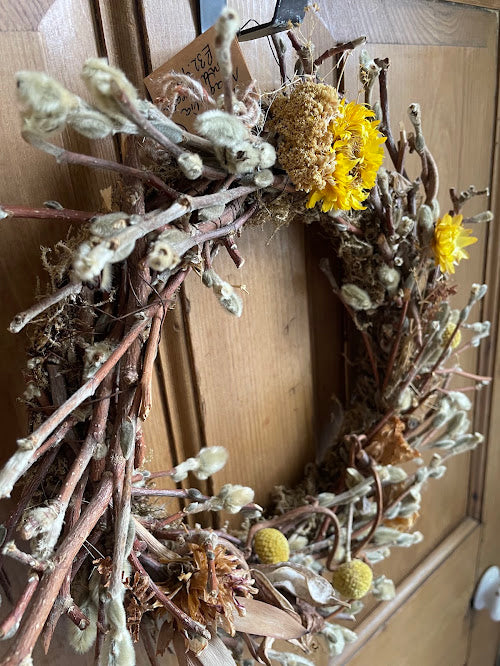 The Fading Light Wreath - magnolia stems and sunny strawflower