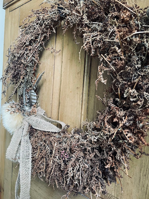 The Harvest Hearth Wreath - bronze ferns and wild feathers evoke the countryside in Autumn