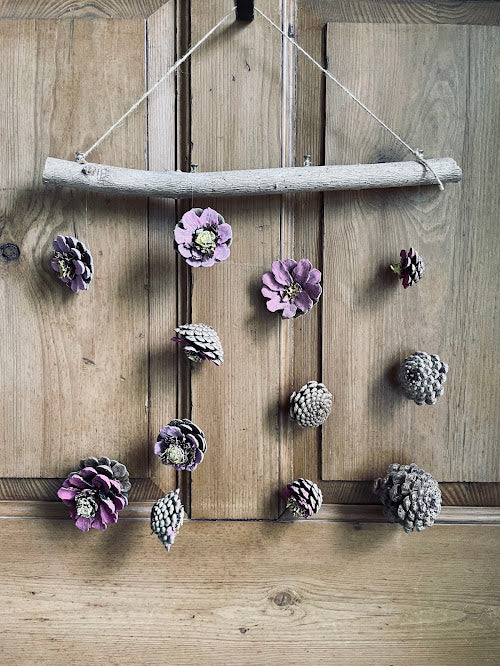 The Heather and Frost pine cone mobile