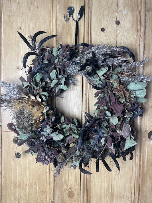 Halloween wreath made with wolf's tail and witches fingers. 45cm.