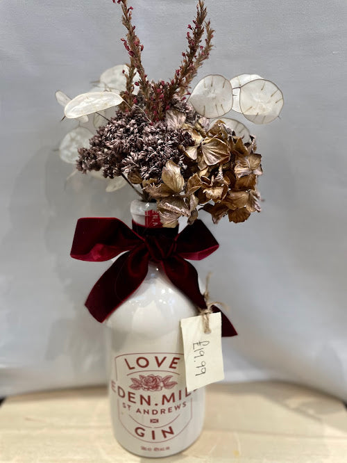 Eden Mill Love Gin ceramic bottle with dried flower bouquet and red velvet bow