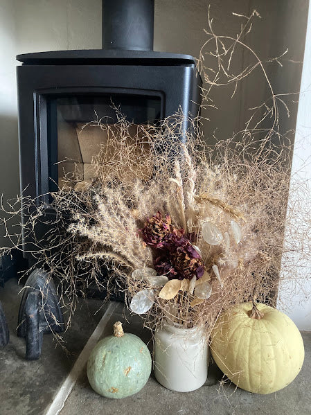 With Honesty - soft grasses with deep purple flowers and lunaria in a cream antique pot