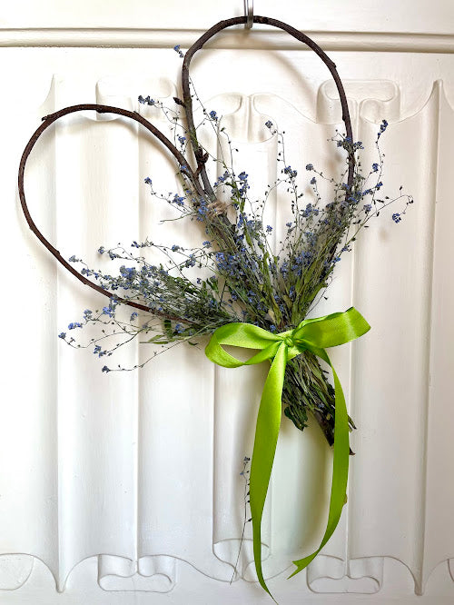 Forget-me-not sweetheart wreath with lime green ribbon