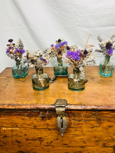 Collection of 5 purple posies in antique aqua coloured ink wells